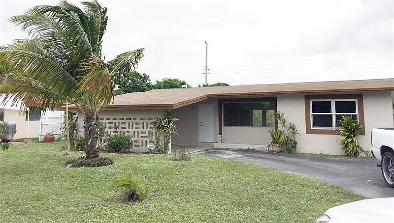 1st image of 810 NE 50th Ct