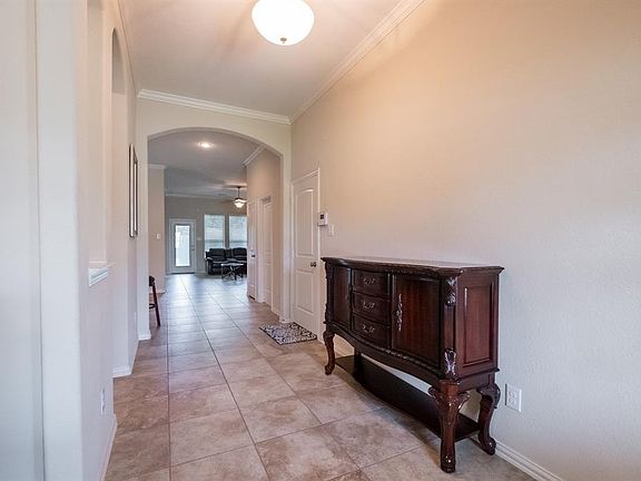 This welcoming entryway is light, bright, and inviting.