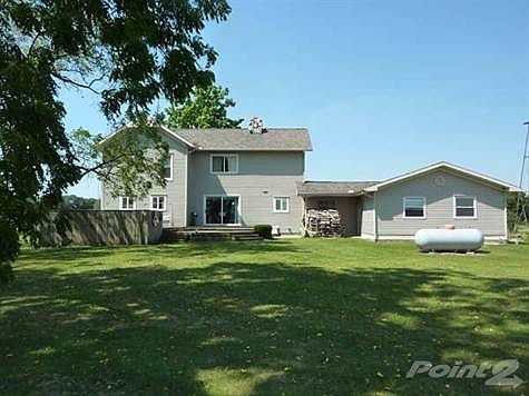 Attached 2 1/2 stall garage and huge deck off the formal dining room.