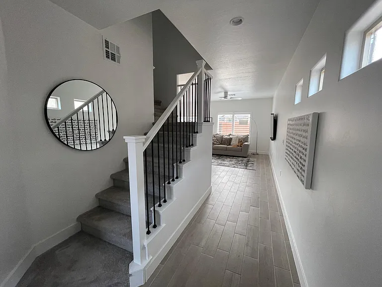 Front door looking toward the living room and upstairs