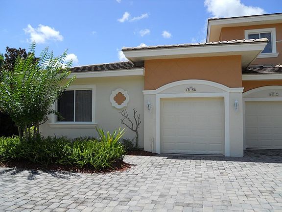 1 car Garage & extra side parking spot. Limit of 2 Vehicles per HOA Rules