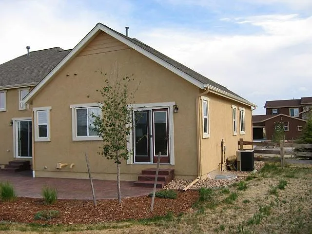 Outside of main bedroom, with walkout to yard.