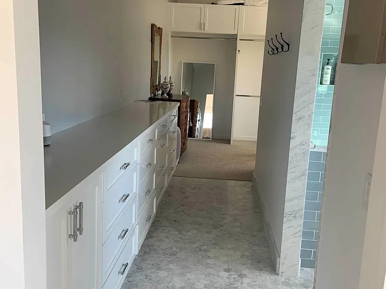 Master closet with custom built in drawers