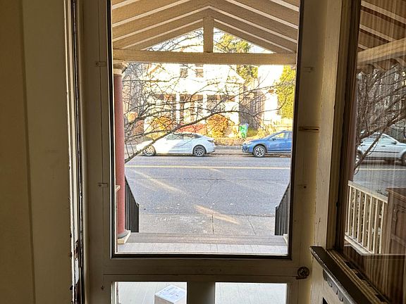 Front door to porch