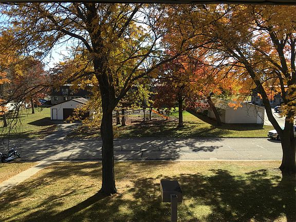 View out the front window of an upper apartment.