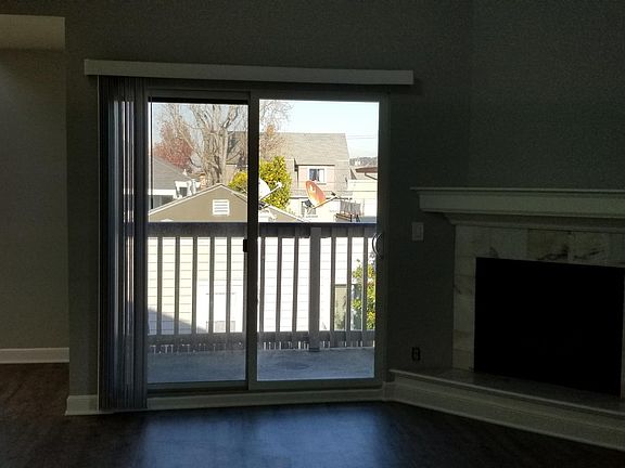 Living Room - looking onto Deck. Dining area on the left.
