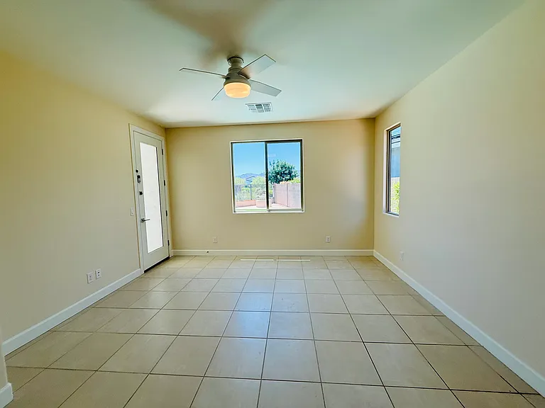 Primary bedroom with door to pool