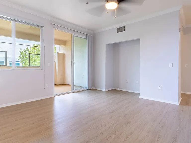 Living Room with Balcony and Hard Surface Flooring