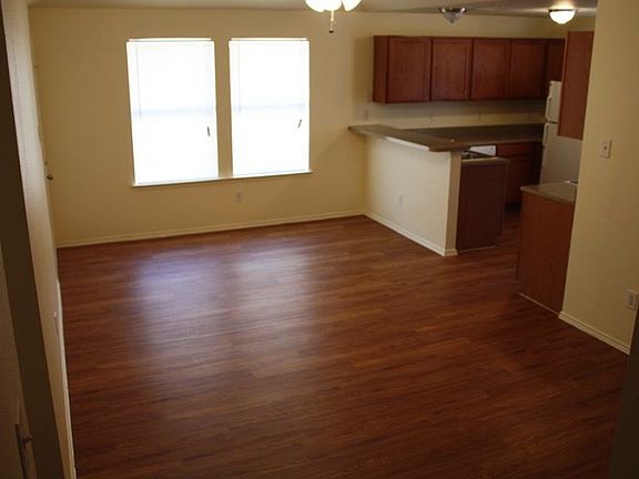 Large Family room (available home has stained concrete floor