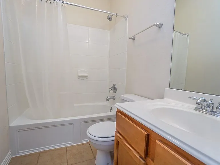7102 Thistlewood Park Ct — Photo 24