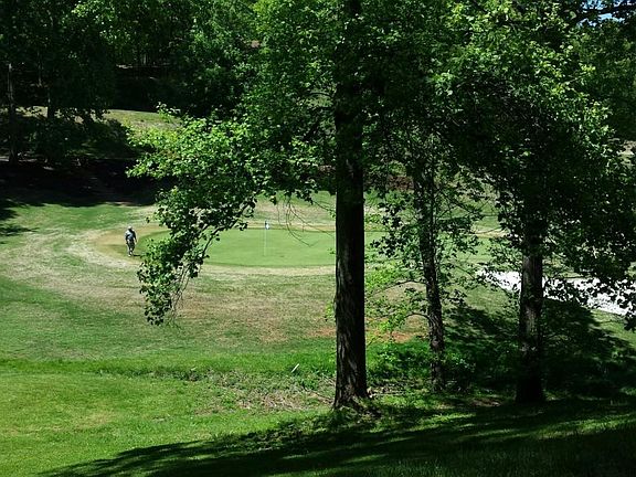 Back view overlooking golf course green