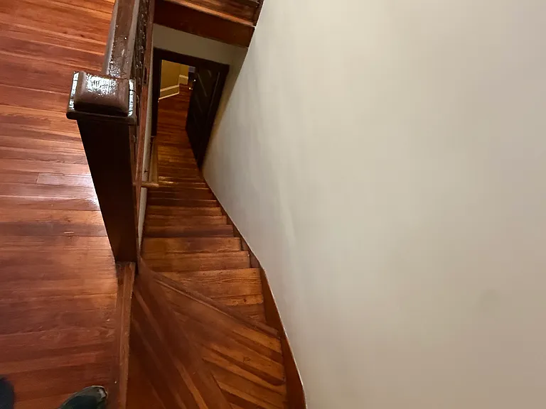 hallway and stairs to second floor; private keyed entrance to 3rd floor apt