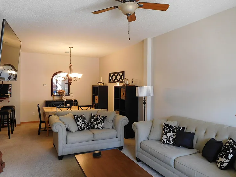 Front door opens to living and dining areas