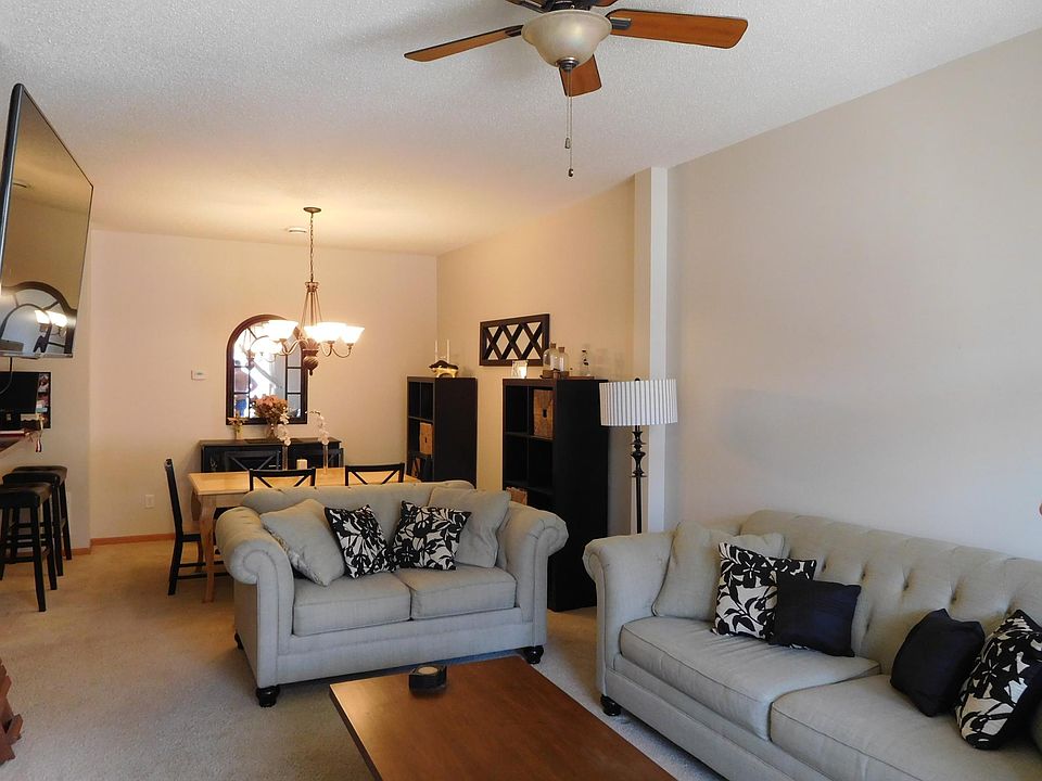 Front door opens to living and dining areas