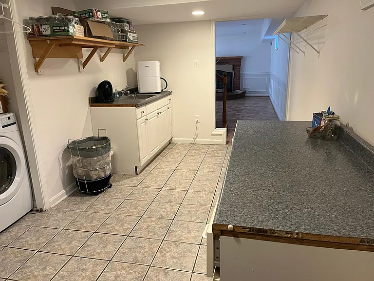 Laundry room + storage - Lower level