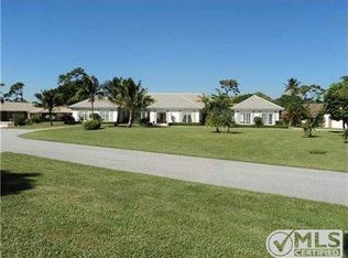 269 N Country Club Dr, Atlantis, FL 33462
