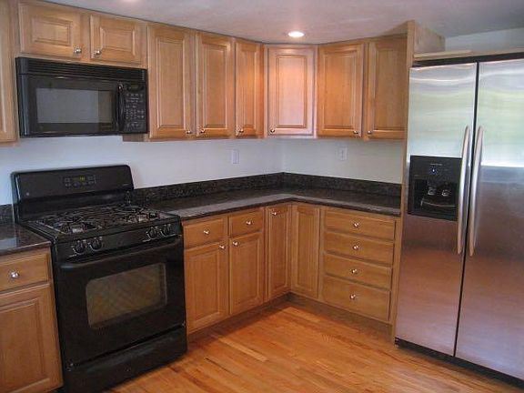 Gas stove and built in microwave, double door stainless steel frig.