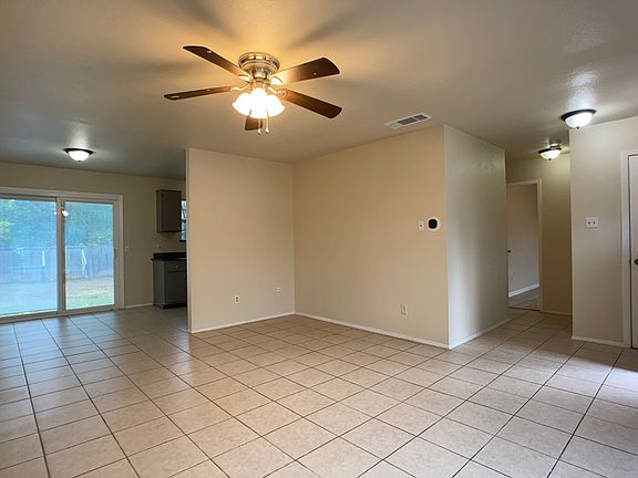 Living/dining area, opposite view. Hall on right to bedrooms.