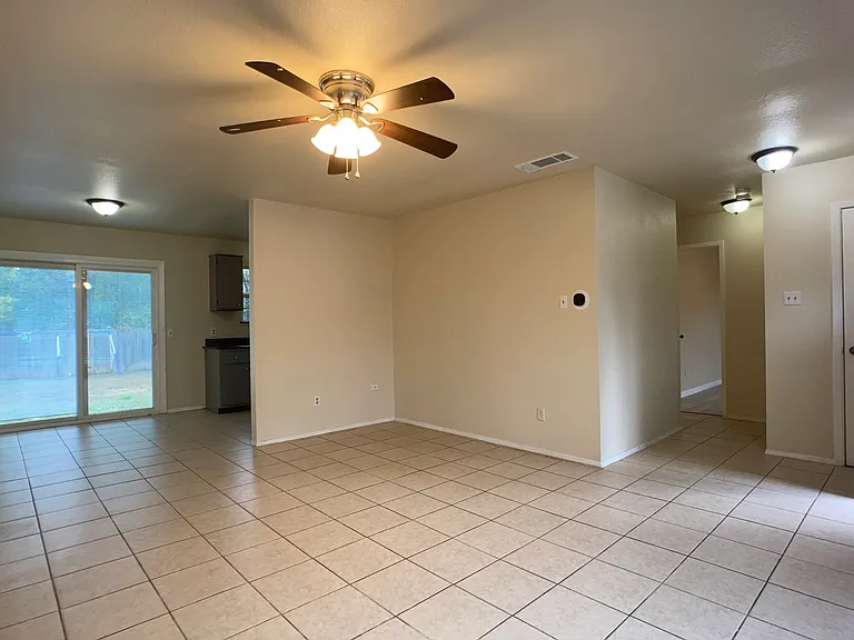 Living/dining area, opposite view. Hall on right to bedrooms.