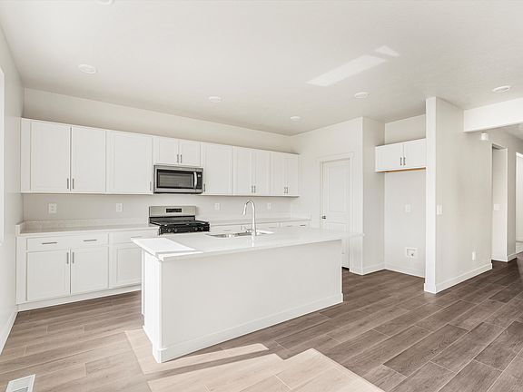 The Moab floorplan interior image taken at a Meritage Homes Community in Eagle Mountain, UT.