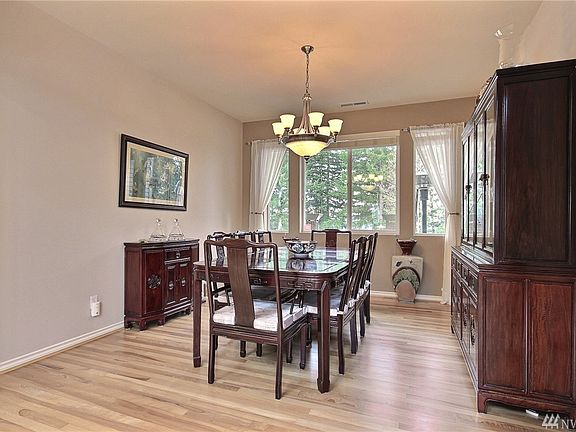 Gorgeous Formal dining room with hardwood floors & plenty of room for all your furniture