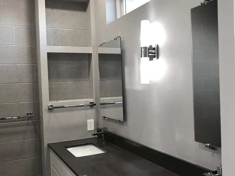 Primary Bathroom with walk in shower and double vanity with drawers (home is unfurnished)