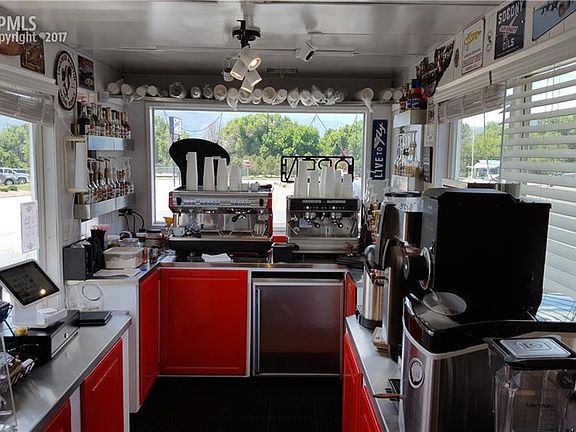 Ample room for 2-3 employees inside the shop.