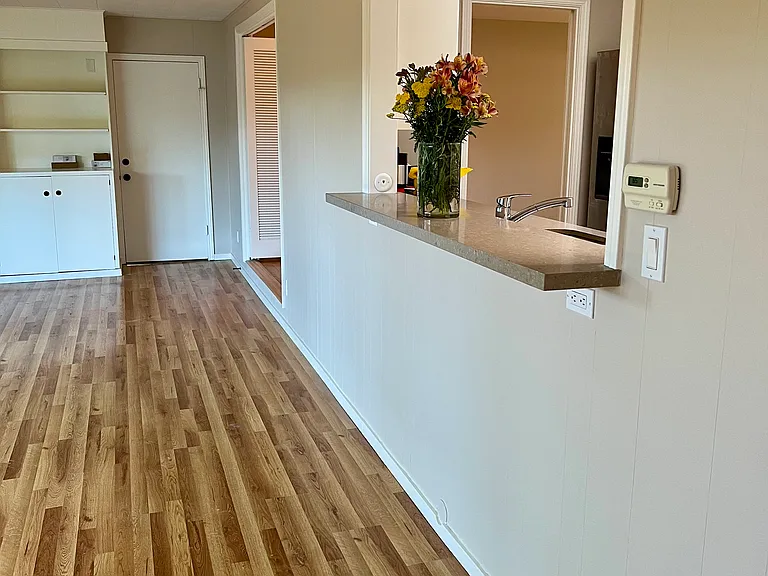 Family Room with view leading to Garage Door