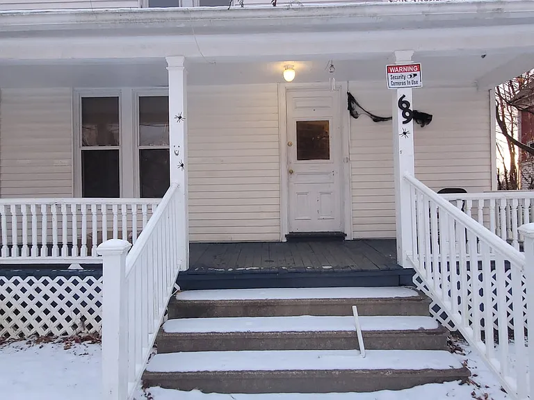 Beautufl Wide Colonial Entrance with wrap around porch