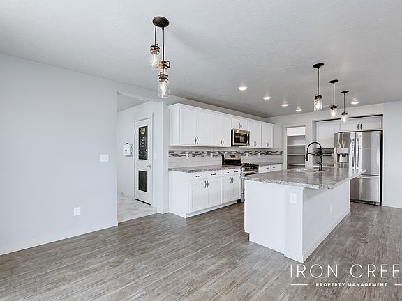 Dining area/kitchen with door to mudroom