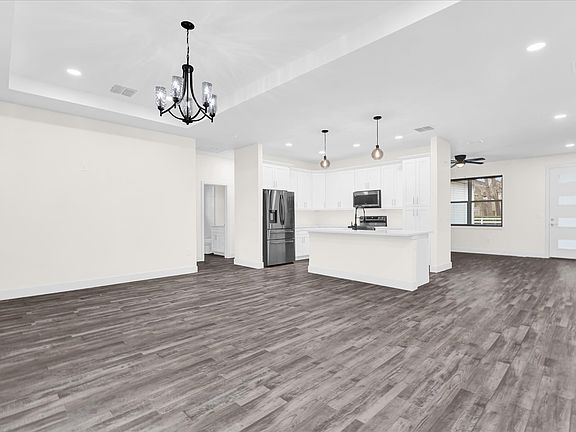 Kitchen / Living Room area with tray ceilings
