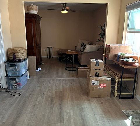 View from kitchen and dining area into living room.