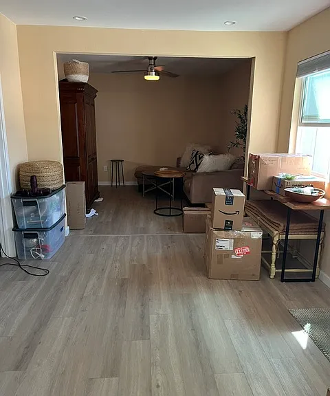 View from kitchen and dining area into living room.