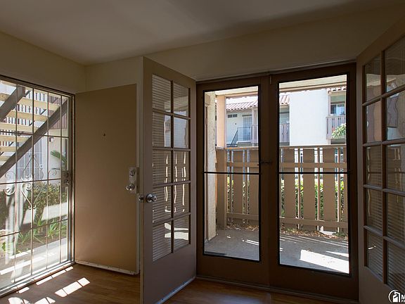 Two bedroom two bath entrance and doors to patio