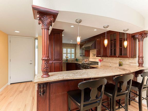 Freshly painted interior walls, light maple hardwood floors, a large skylight & an entertainer's kitchen greet you once you enter this exceptional condo.