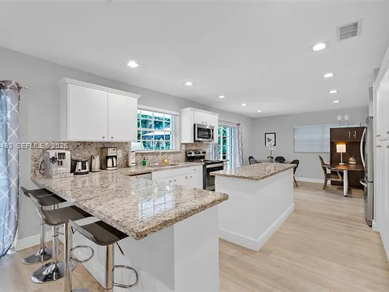 7711 Coquina Dr — Photo 11