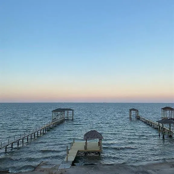 The view from the large upstairs balcony. **Please note that the effects of several hurricanes this past summer unfortunately destroyed the pier. We are currently working on the redesign and rebuild of the pier.**