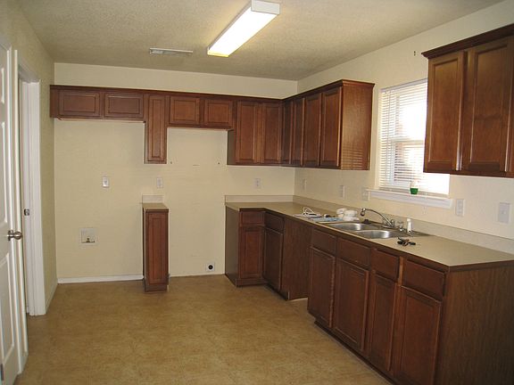 Owner has installed a stove & dishwasher