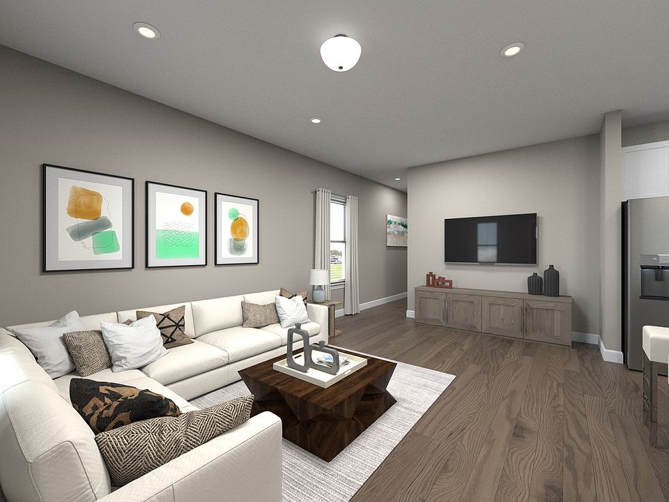 The open-concept living space provides the perfect space to entertain friends and family.