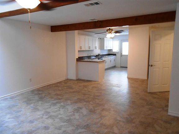 Kitchen opens to the Living/Dining Room.