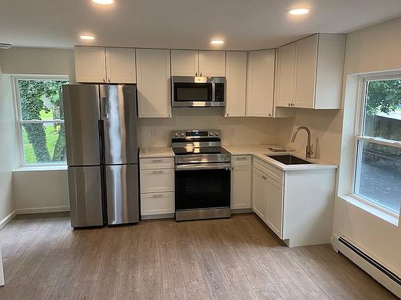 New fridge. New Microwave. New electric range. New sink, cabinets and floor. Tile backsplash will be installed before Oct 1.
