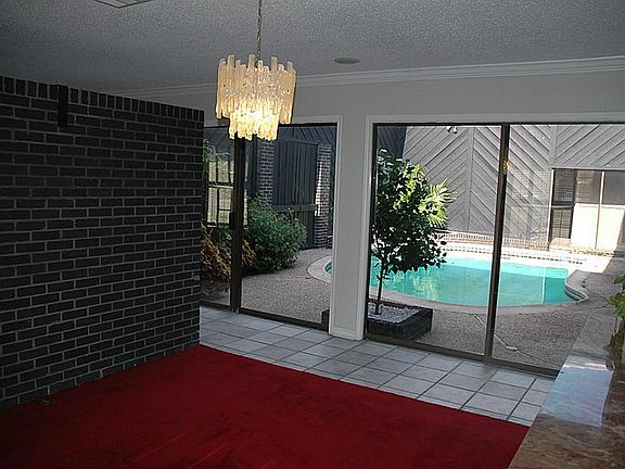 Living Room wrapped around courtyard pool