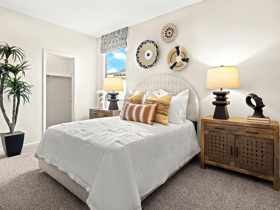 Spacious third bedroom with walk-in closet.