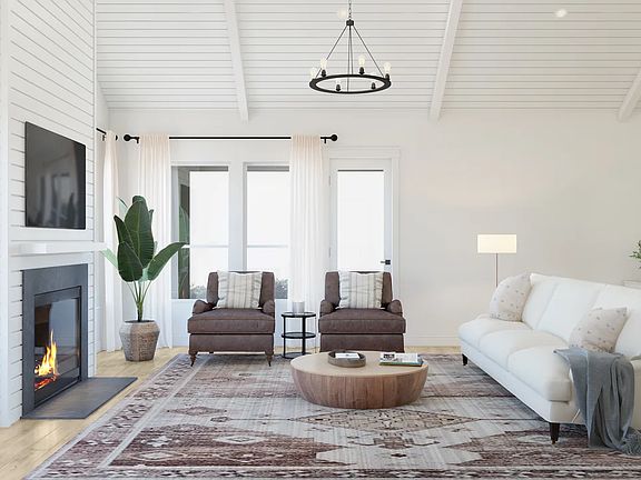 Great room with vaulted ceiling, shiplap and white beams