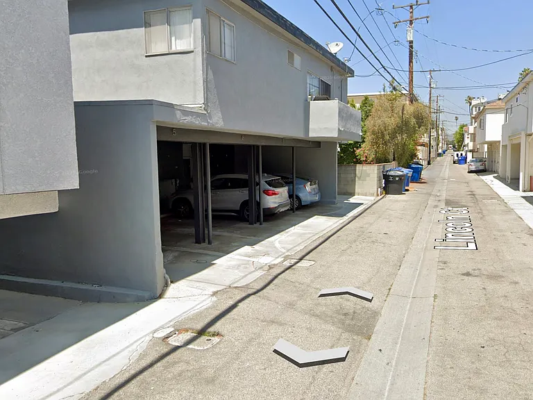 Alleyway behind the building looking north.