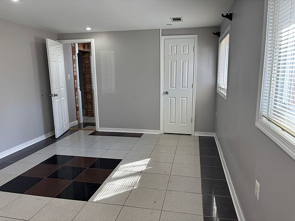 Large bedroom with closet and 2 large windows