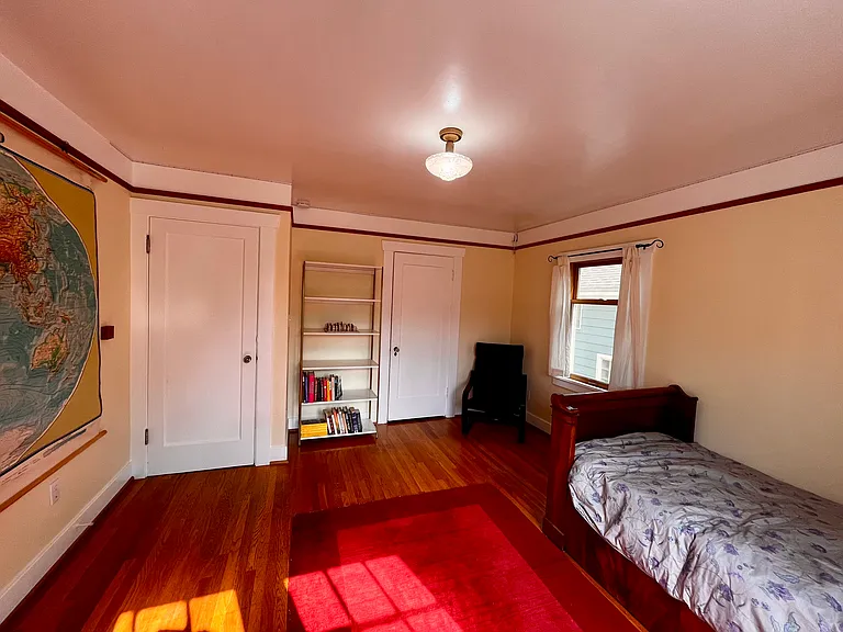 Large walk-in closets with shelves on either side as you enter.