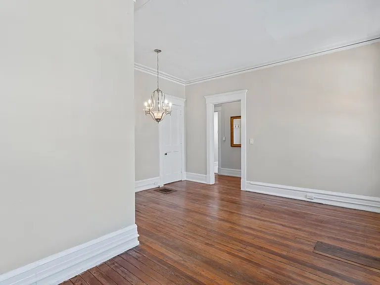 Looking from rear to front of living and dining room