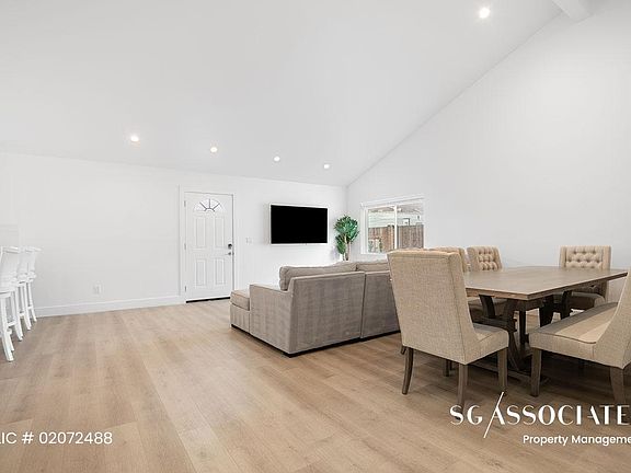 Great Room with soaring high ceilings, and beautifully appointed furnishings