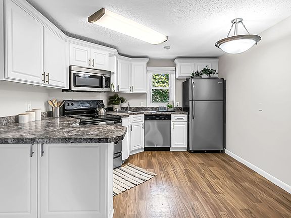 Our kitchens offer timeless white cabinetry and gleaming stainless steel appliances, which exude modern functionality with classic charm.